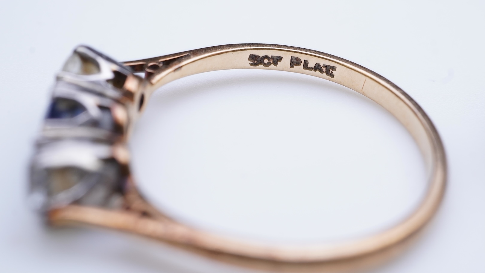 A group of three rings and a tie pin